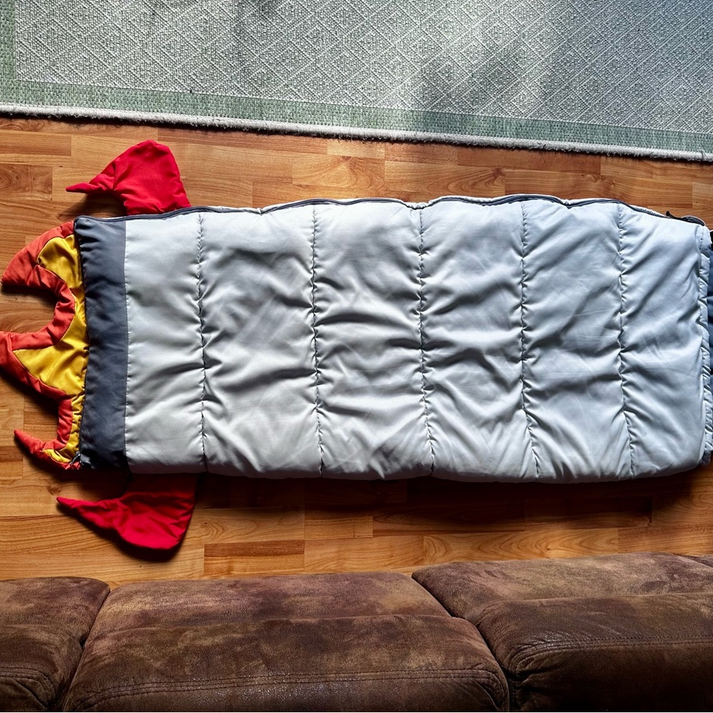 Cozy Gray Sleeping Bag with Red Accents